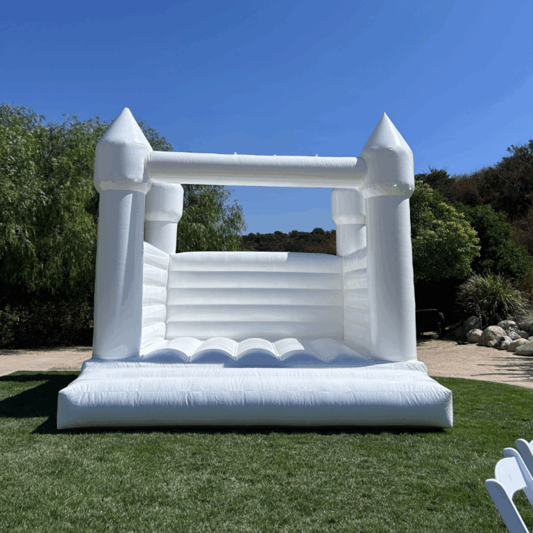 white bounce house for wedding